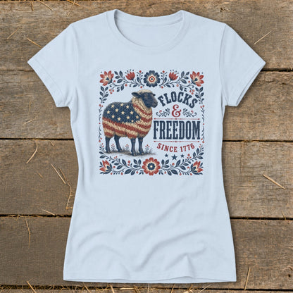 Sheep with American flag pattern and "Flocks & Freedom Since 1776" text.