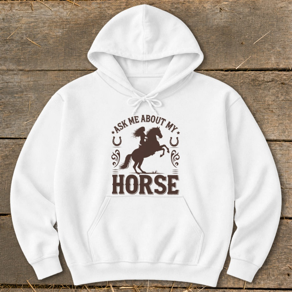 White hoodie with a graphic of a person riding a rearing horse and the text "Ask me about my horse".