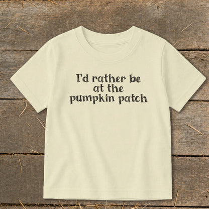 Cream t-shirt with black text that reads "I'd rather be at the pumpkin patch."