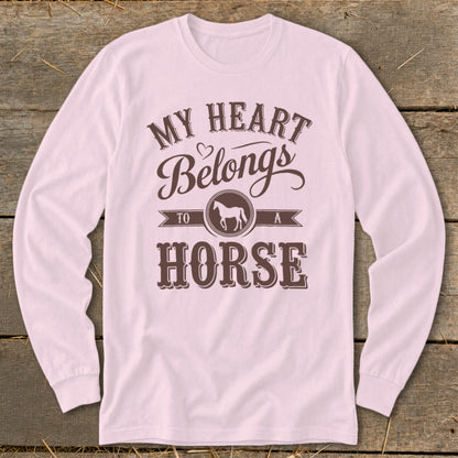 Long sleeve shirt with "My Heart Belongs To A Horse" text and horse graphic.