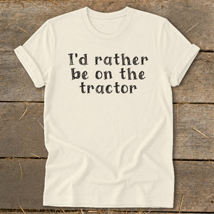 Cream t-shirt with black text reading "I'd rather be on the tractor."