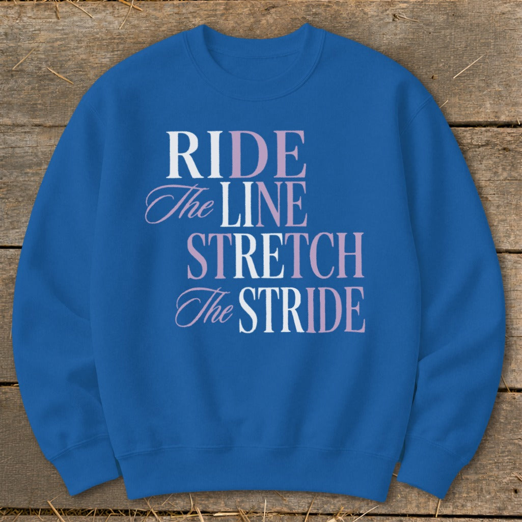 Blue sweatshirt with text "RIDE The LINE STRETCH The STRIDE".