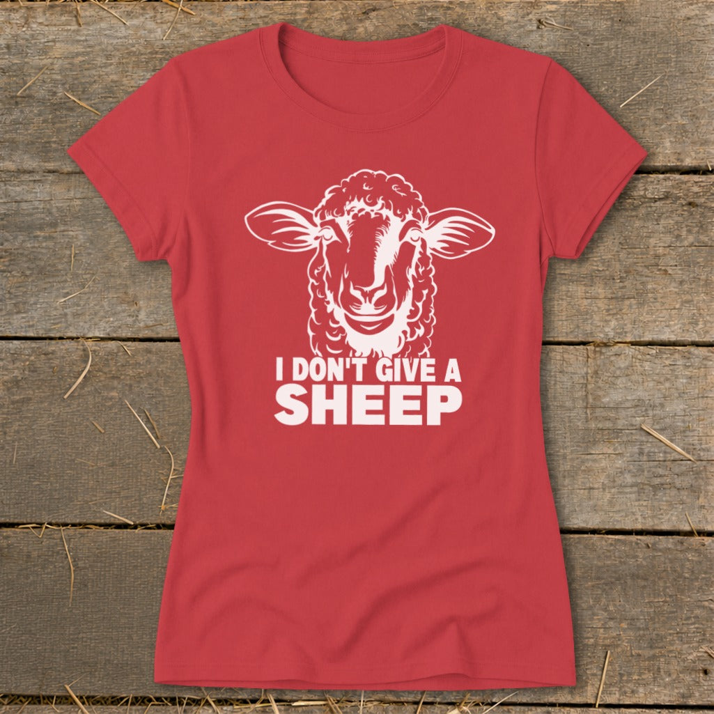 Red t-shirt with white graphic of a sheep and text "I DON'T GIVE A SHEEP".