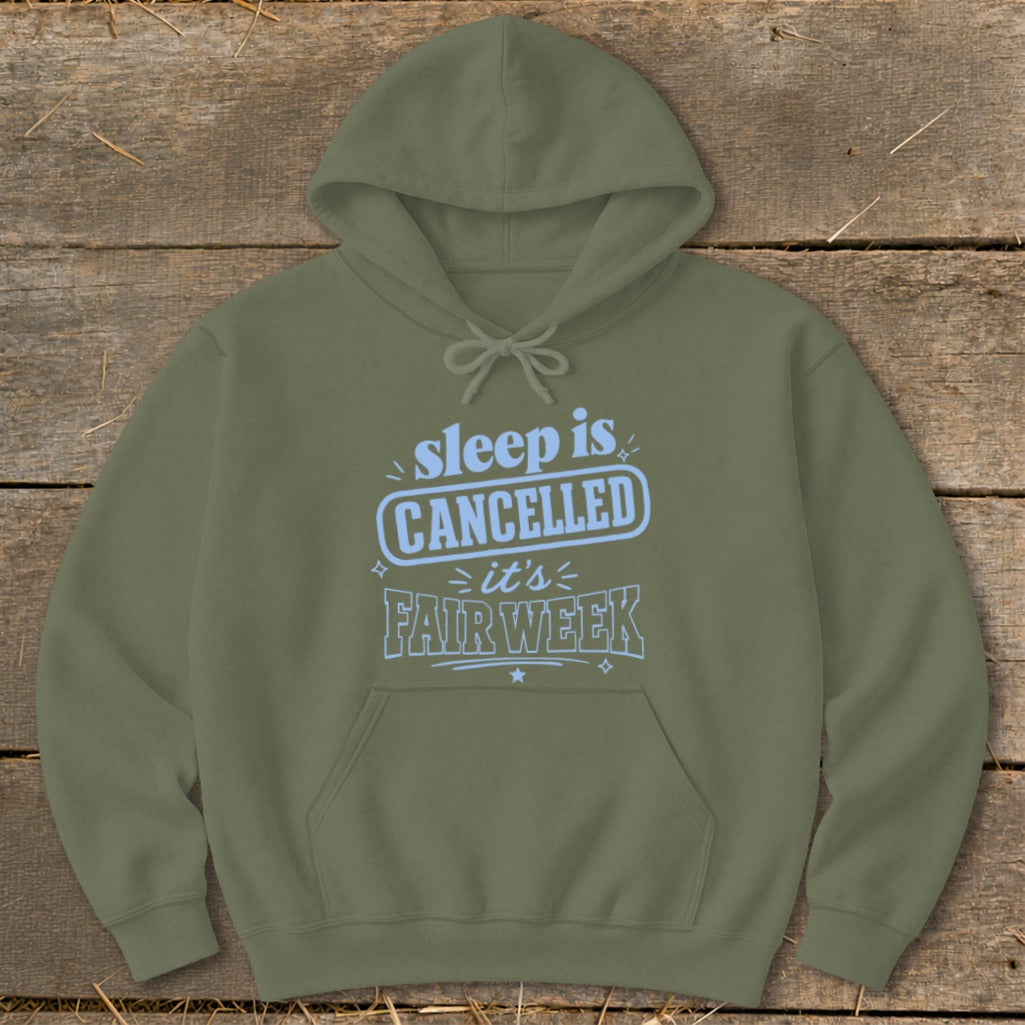 Olive green hoodie with light blue text: sleep is CANCELLED it's FAIR WEEK.