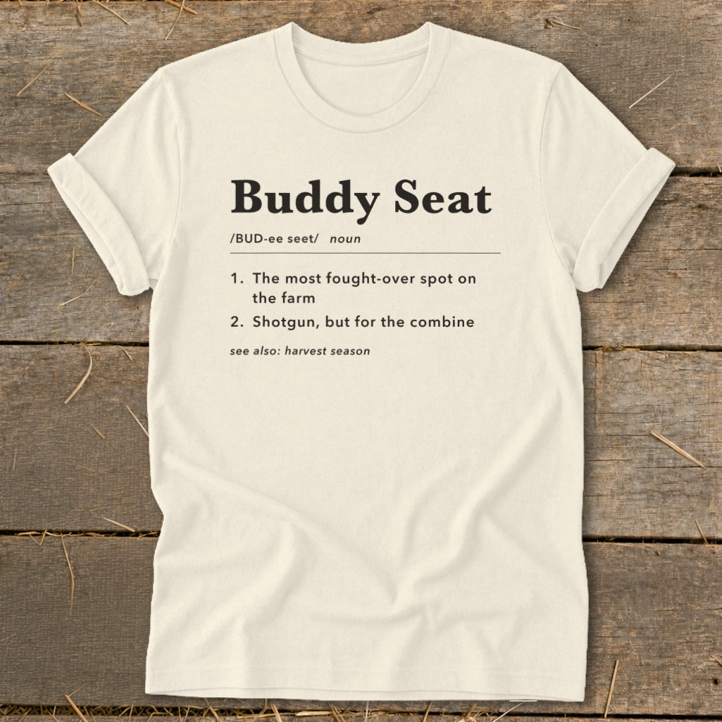 Cream t-shirt with "Buddy Seat" definition.