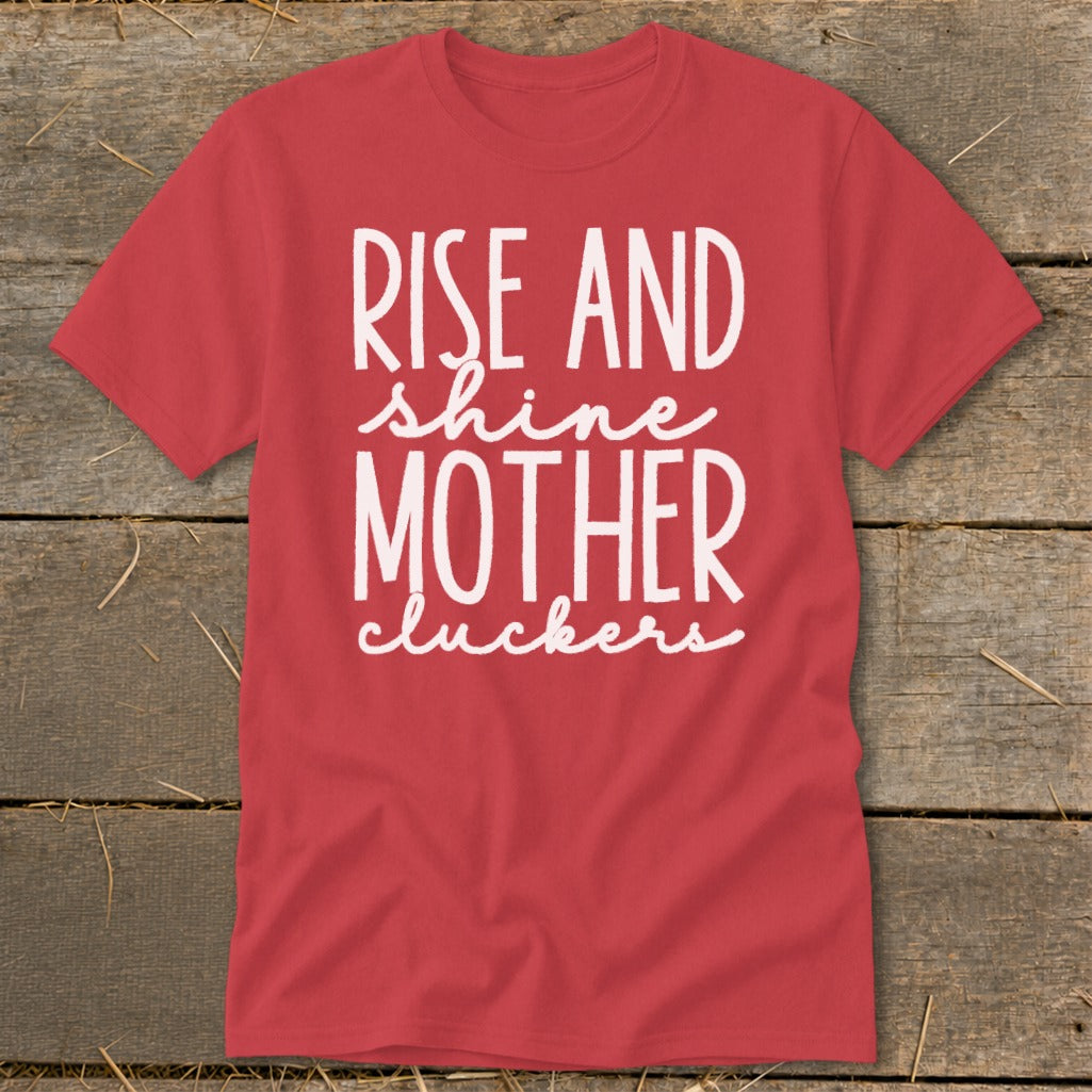Red t-shirt with white text "Rise and shine Mother cluckers."