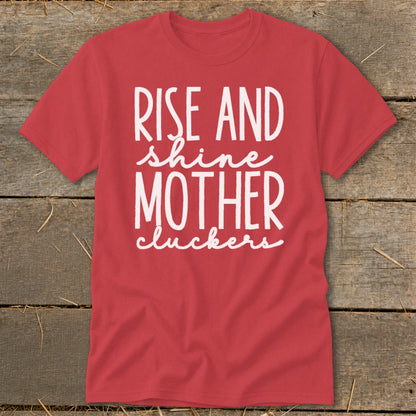 Red t-shirt with white text "Rise and shine Mother cluckers."