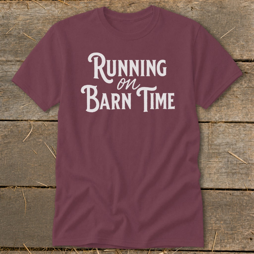 Maroon t-shirt with white text reading "Running on Barn Time".