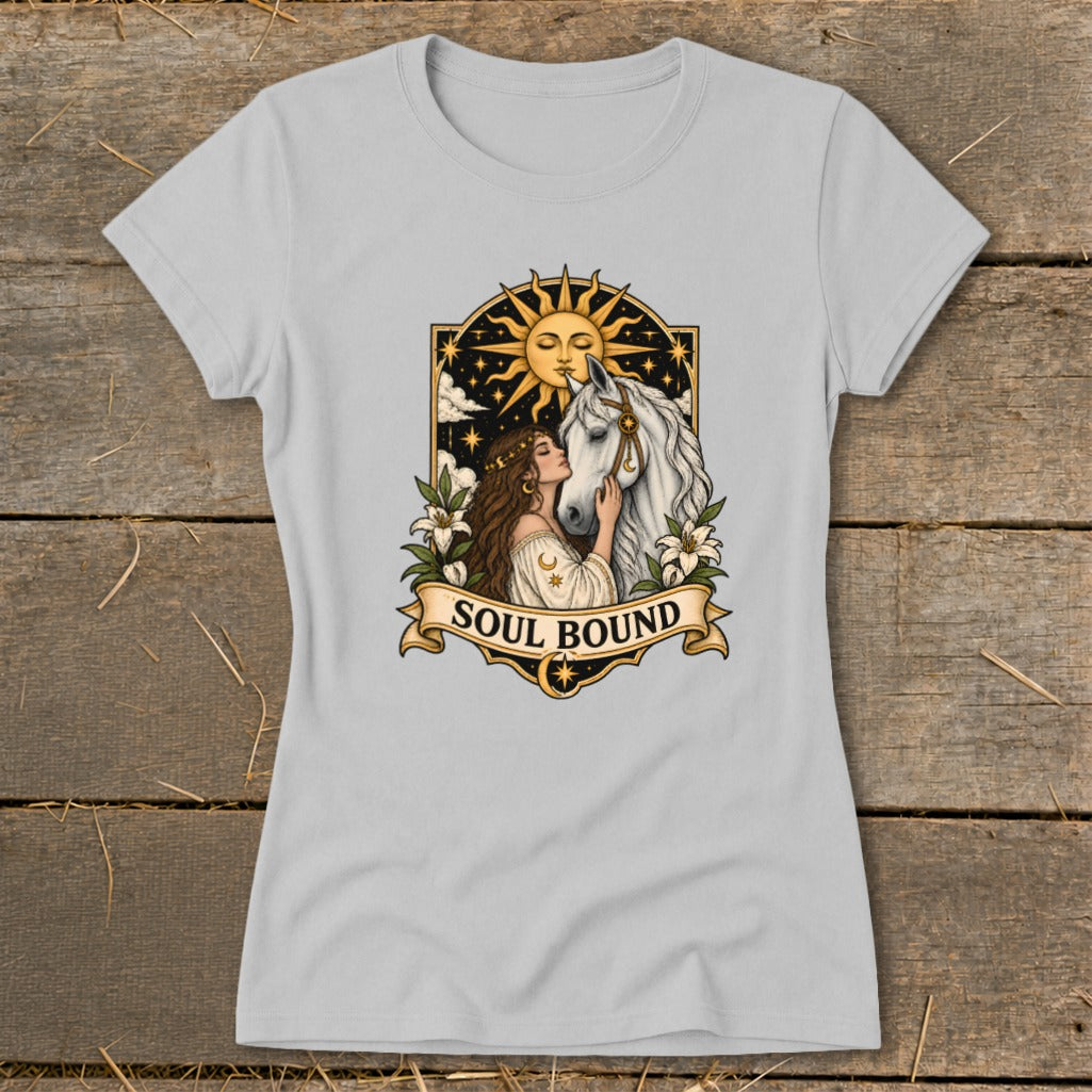 Woman embraces white horse under sun and moon emblem, text "Soul Bound".