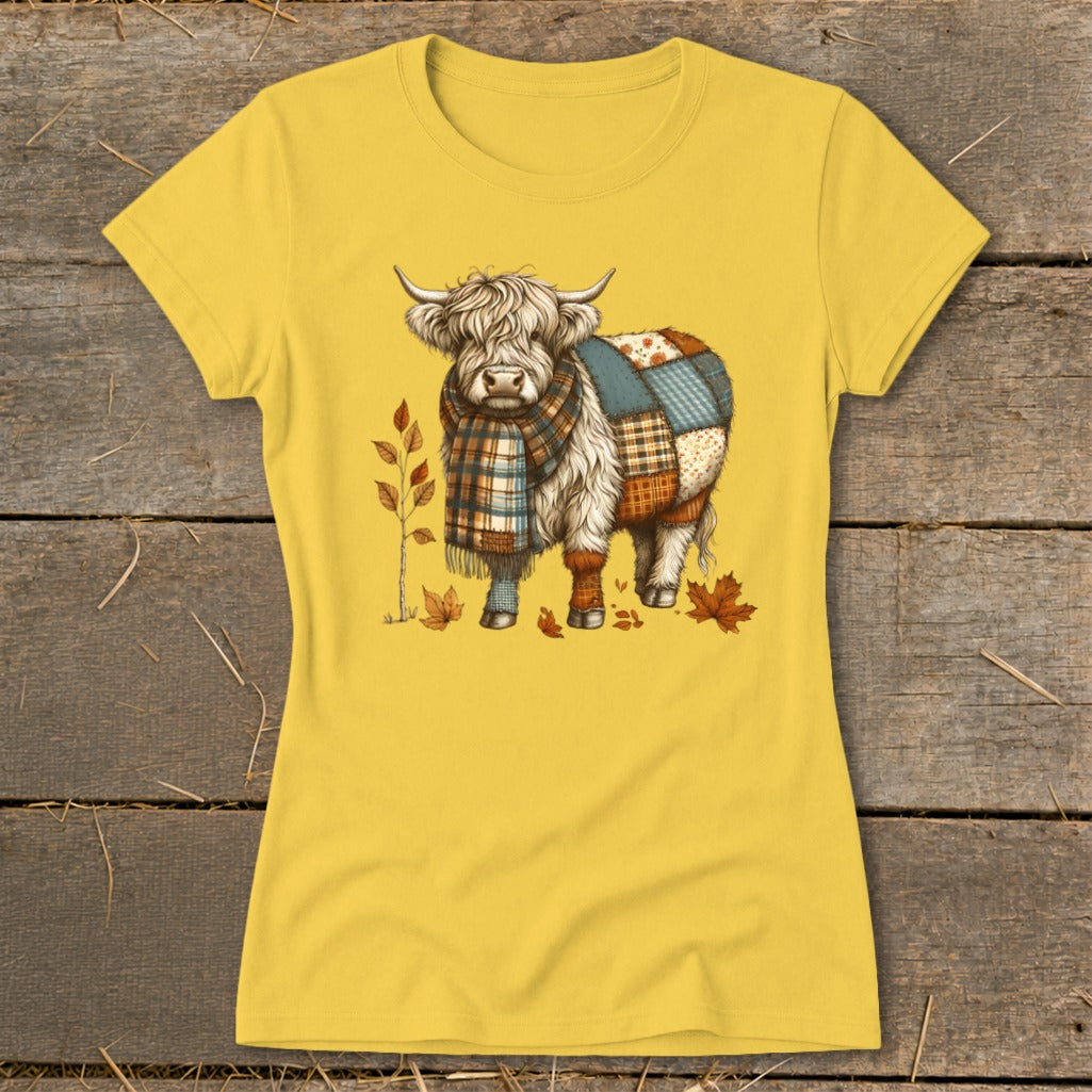 Yellow t-shirt with a fluffy cow wearing a plaid scarf and patchwork.