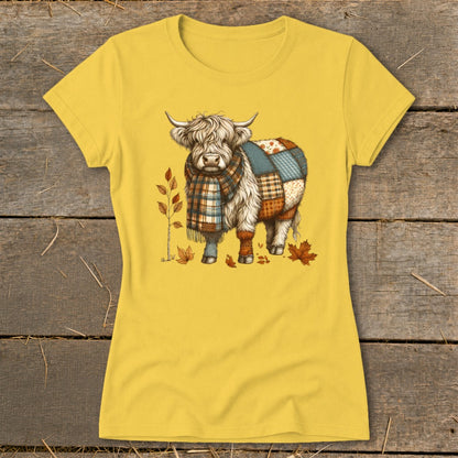 Yellow t-shirt with a fluffy cow wearing a plaid scarf and patchwork.