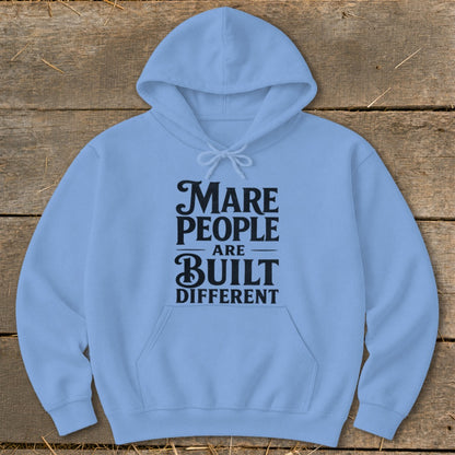 Light blue hoodie with black text "Mare People Are Built Different".