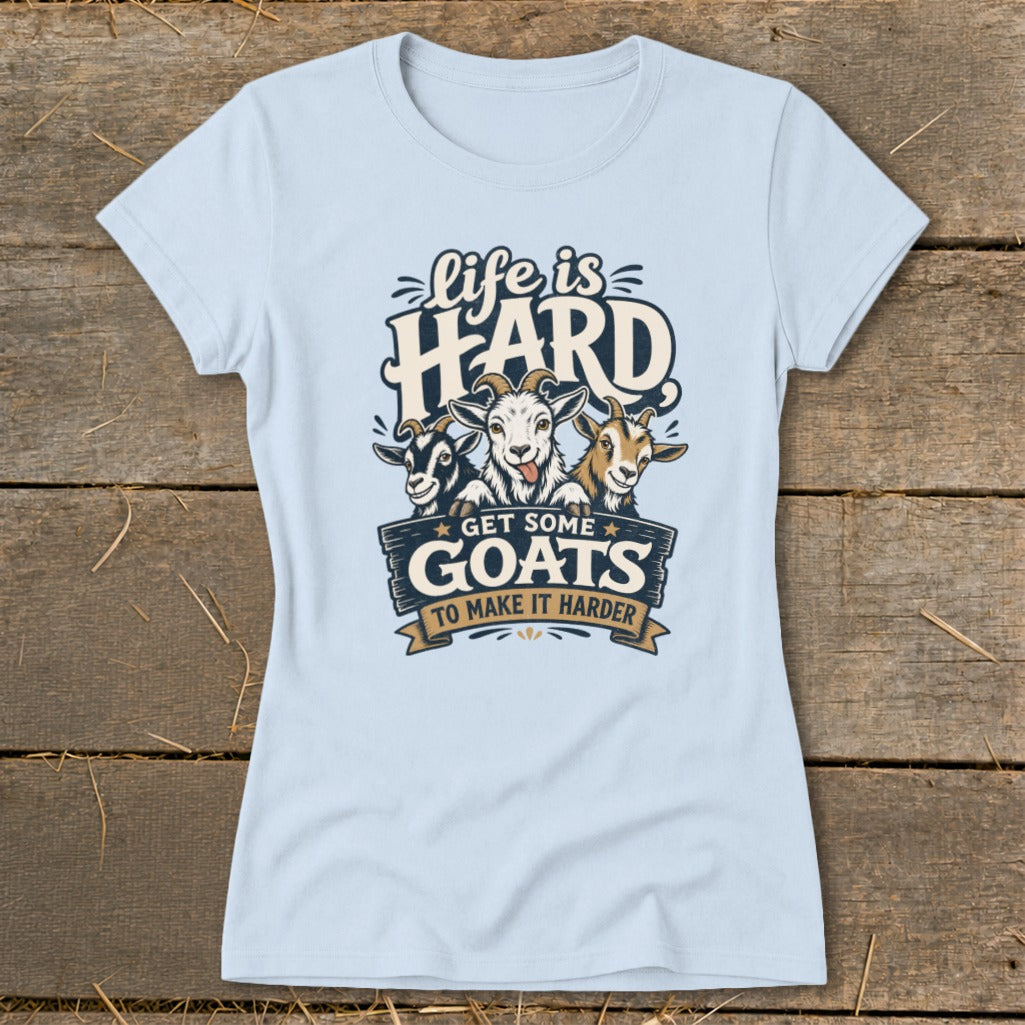 Light blue t-shirt with "Life is Hard Get Some Goats To Make It Harder" text and three goats.