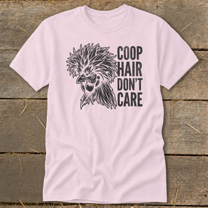 Pink t-shirt with a black graphic of a crested chicken and the text "Coop Hair Don't Care".