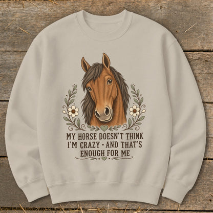 Crewneck sweatshirt with horse graphic and text "My horse doesn't think I'm crazy and that's enough for me."