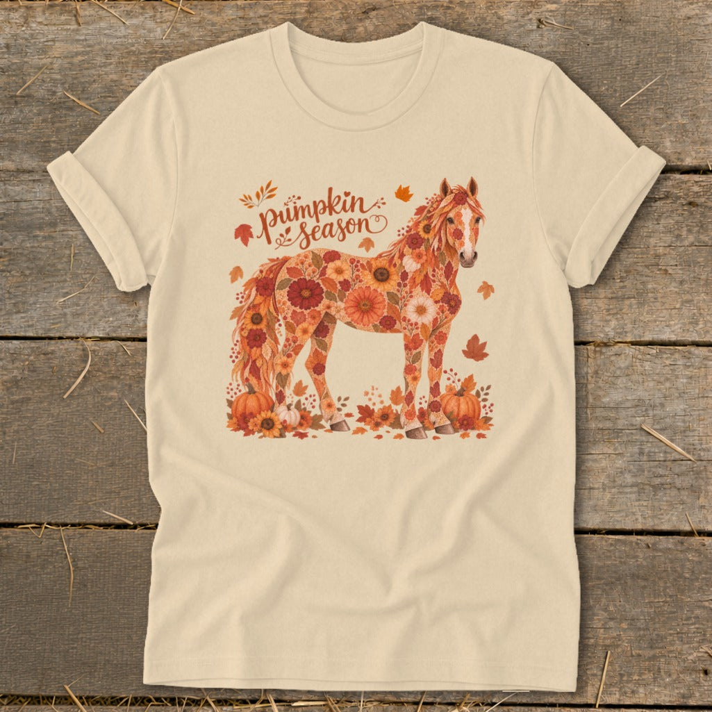Cream t-shirt with a horse adorned with flowers and pumpkins, and "Pumpkin season" text.