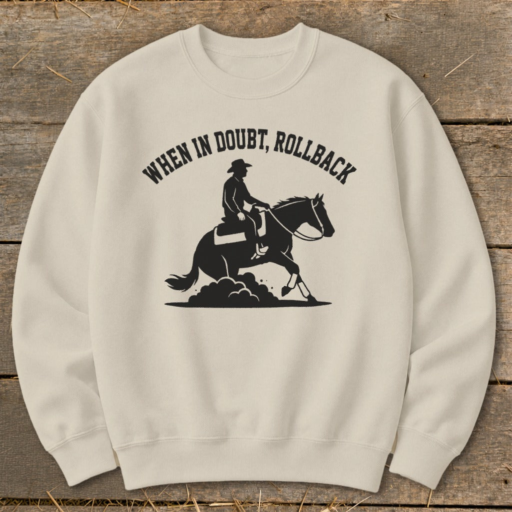 Light tan sweatshirt with black graphic of rider and horse, reading "WHEN IN DOUBT, ROLLBACK".