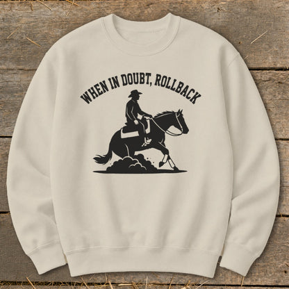 Light tan sweatshirt with black graphic of rider and horse, reading "WHEN IN DOUBT, ROLLBACK".