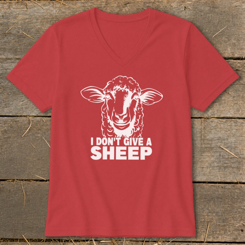 Red t-shirt with white graphic of a sheep and text "I DON'T GIVE A SHEEP".