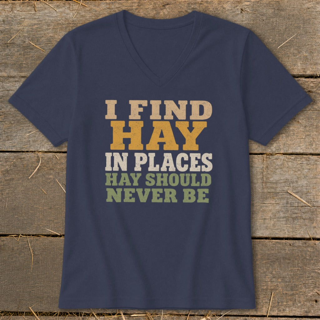 Navy v-neck t-shirt with text "I FIND HAY IN PLACES HAY SHOULD NEVER BE".