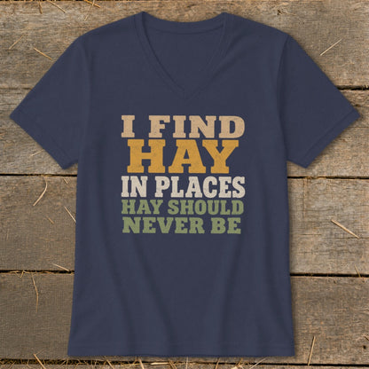 Navy v-neck t-shirt with text "I FIND HAY IN PLACES HAY SHOULD NEVER BE".