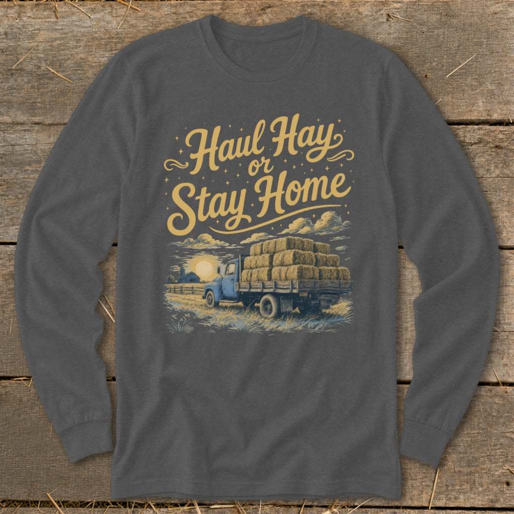 Long sleeve shirt with "Haul Hay or Stay Home" text and hay-loaded truck graphic.