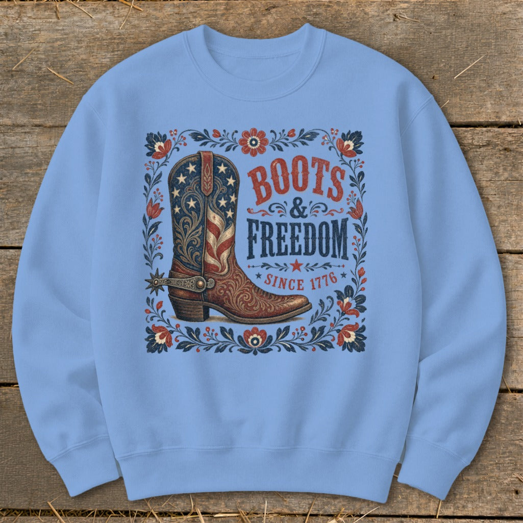 Light blue sweatshirt with a patriotic boot graphic that says "Boots & Freedom Since 1776."