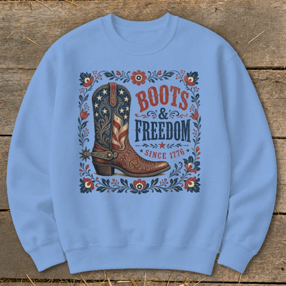 Light blue sweatshirt with a patriotic boot graphic that says "Boots & Freedom Since 1776."