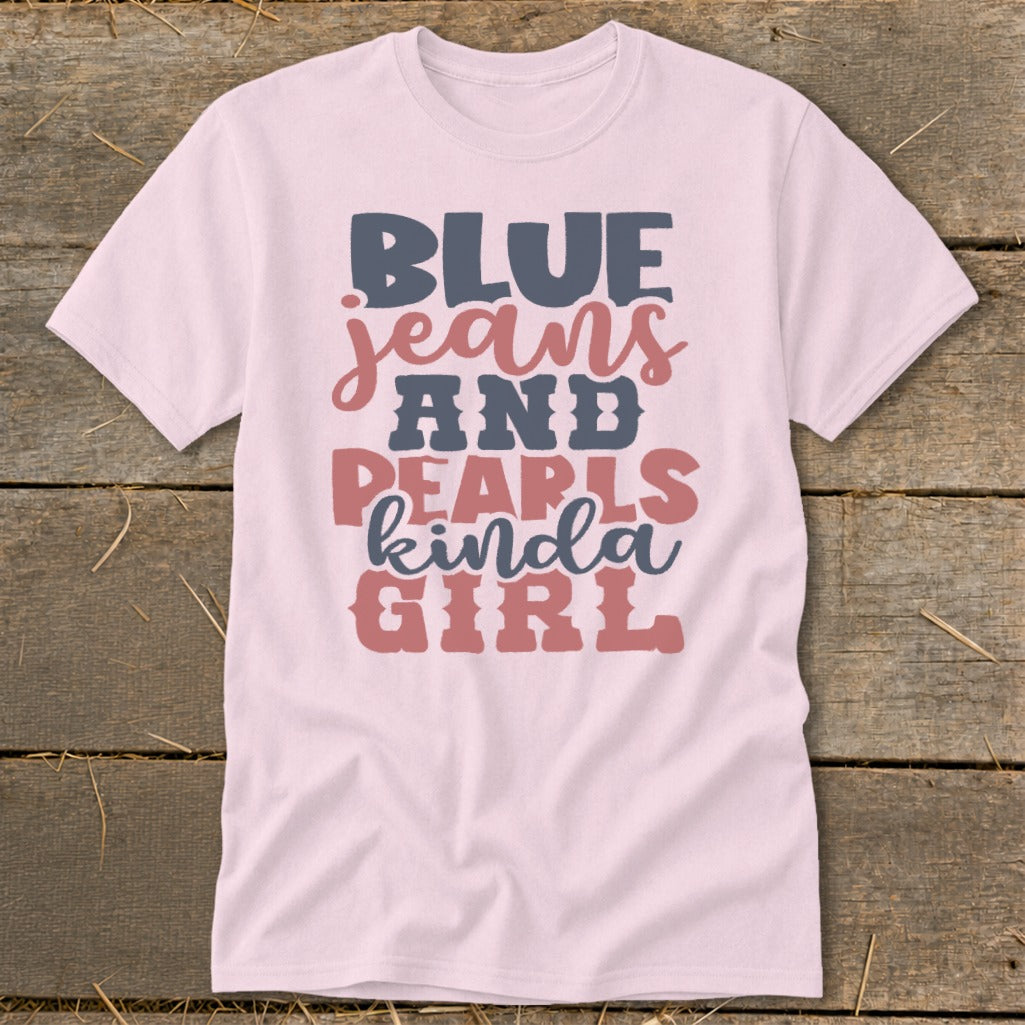 Pink t-shirt with "BLUE jeans AND PEARLS kinda GIRL" graphic.