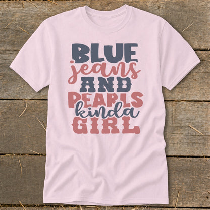 Pink t-shirt with "BLUE jeans AND PEARLS kinda GIRL" graphic.