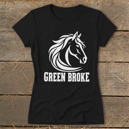 Black women’s t-shirt featuring a white graphic of a horse head and the text GREEN BROKE.