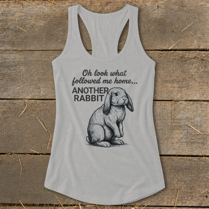 Gray tank top with text "Oh look what followed me home... ANOTHER RABBIT" and a rabbit illustration.