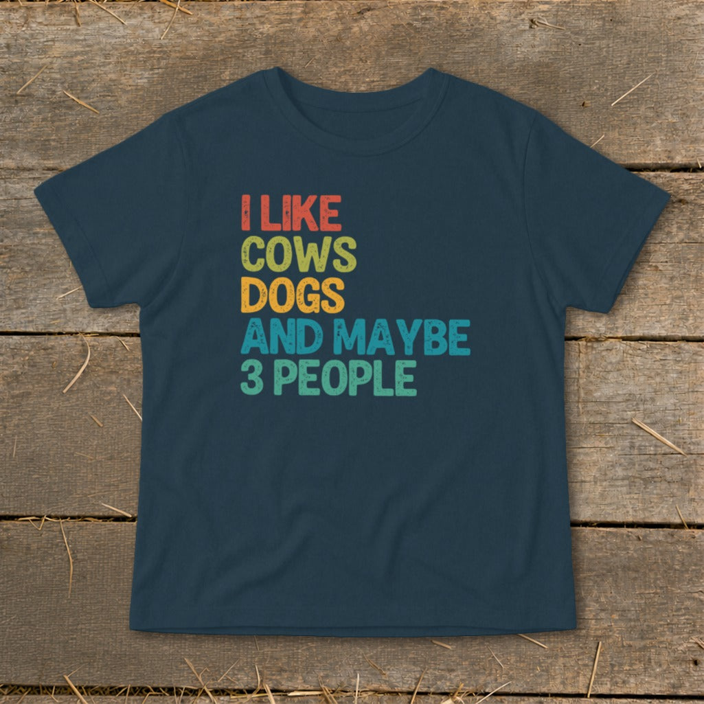 Navy t-shirt with text "I LIKE COWS DOGS AND MAYBE 3 PEOPLE".