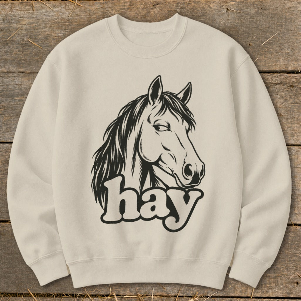 Cream sweatshirt with a black line drawing of a horse's head and the word "hay".