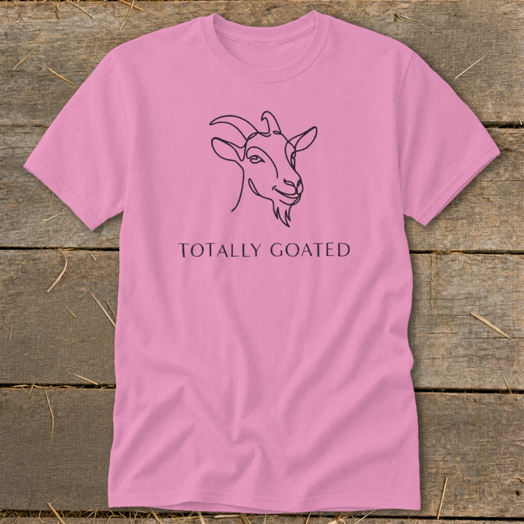 Pink t-shirt with a black line drawing of a goat's head and text "TOTALLY GOATED."