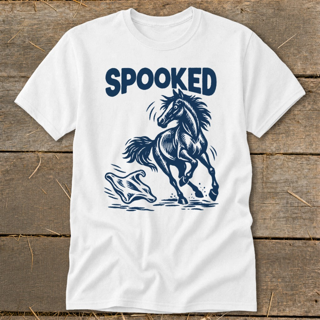 White t-shirt with "SPOOKED" text above a startled horse and a ghost.