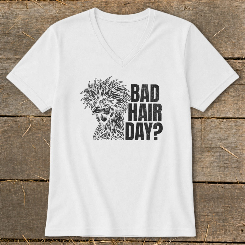 White v-neck t-shirt with a stylized chicken graphic and the text "BAD HAIR DAY?".
