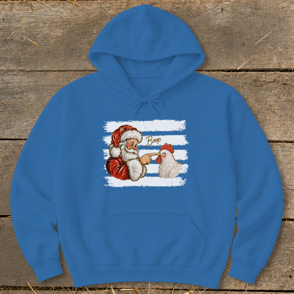 Santa booping a chicken on a blue hoodie with white stripes.