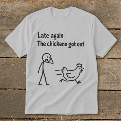 Light gray t-shirt with black text and stick figures of a person and a running chicken.