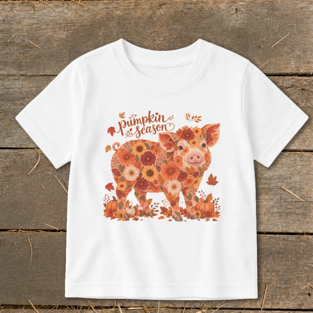 White t-shirt with a floral pig graphic and "Pumpkin Season" text.