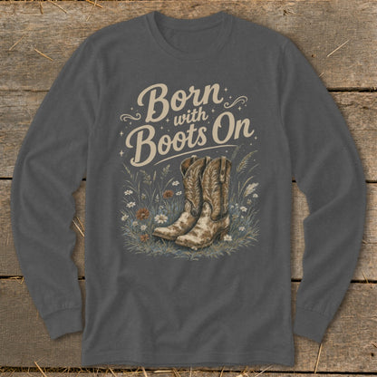 Long sleeve shirt with "Born with Boots On" text and cowboy boots in flowers.