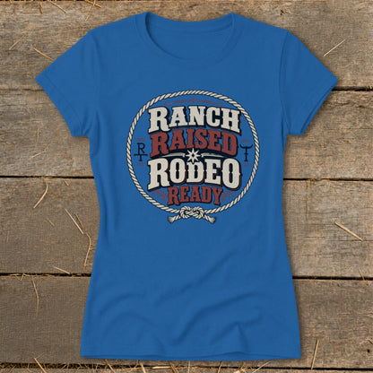 Blue t-shirt with "Ranch Raised Rodeo Ready" text inside a rope circle.