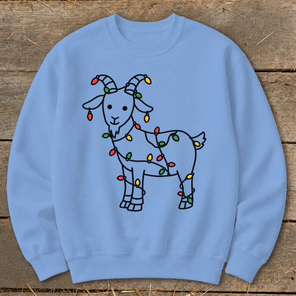 Light blue sweatshirt with a line drawing of a goat wrapped in colorful Christmas lights.