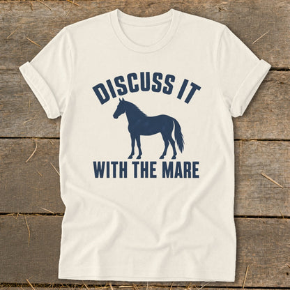 Cream t-shirt with navy blue text and horse silhouette that reads "Discuss It With The Mare".