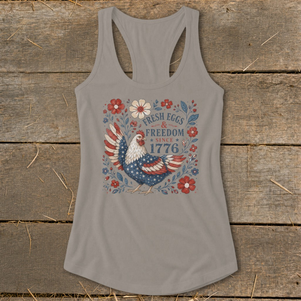 Tank top with patriotic chicken, flowers, and "Fresh Eggs & Freedom Since 1776" text.