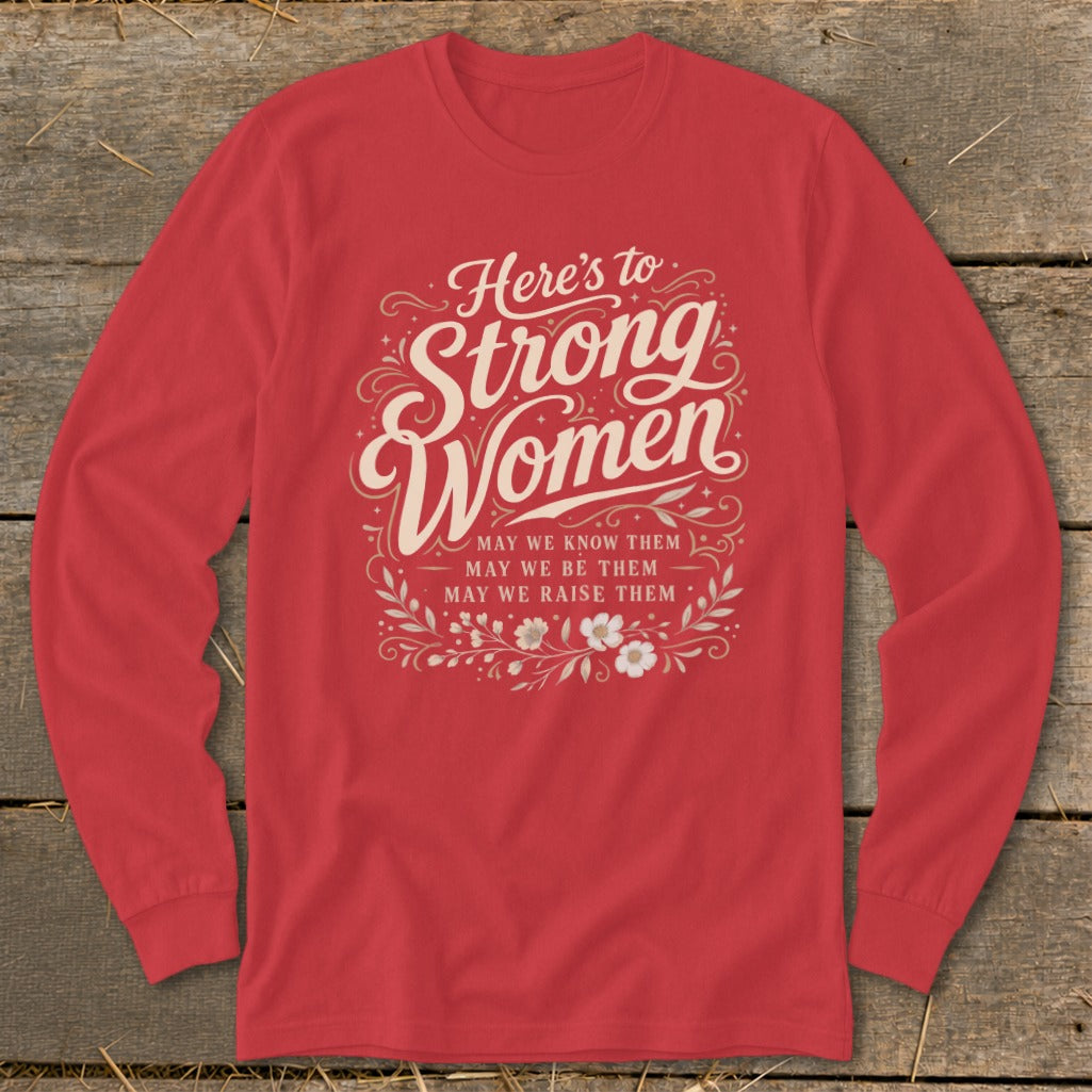 Red long-sleeve shirt with "Here's to Strong Women" and floral design.