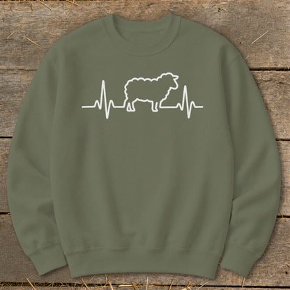 Olive green crewneck sweatshirt featuring a white graphic of a sheep integrated into a heartbeat monitor line.