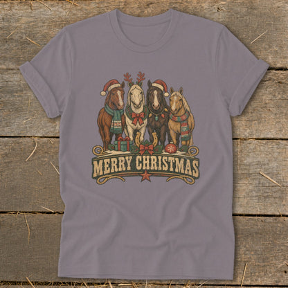 Four horses in festive holiday attire stand with "Merry Christmas" text.