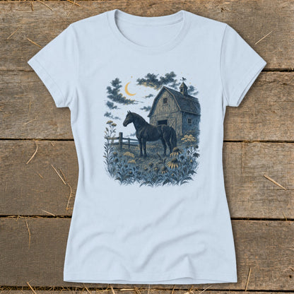 Dark horse stands in field before barn under crescent moon with flowers.