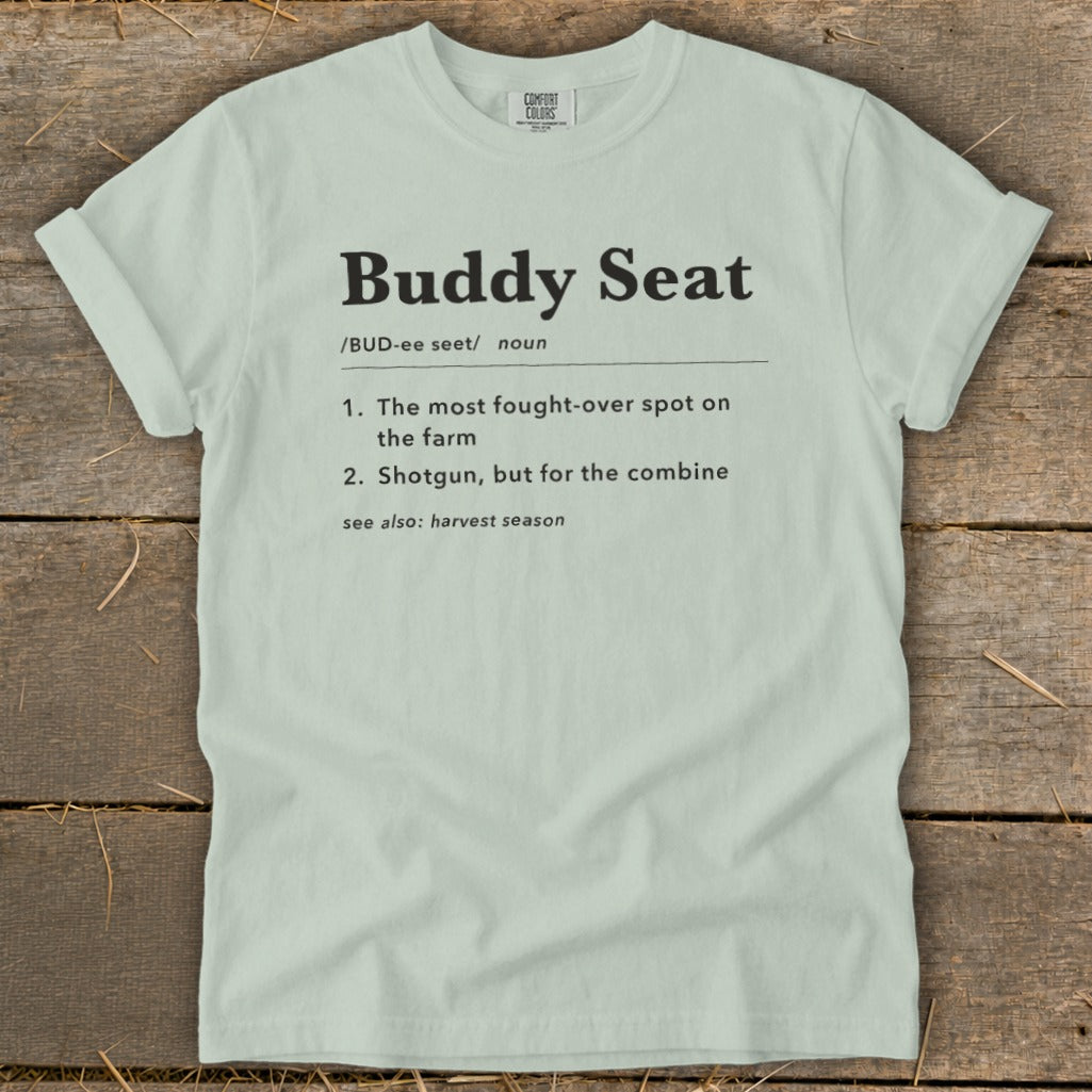 Light green t-shirt with "Buddy Seat" definition printed in black text.